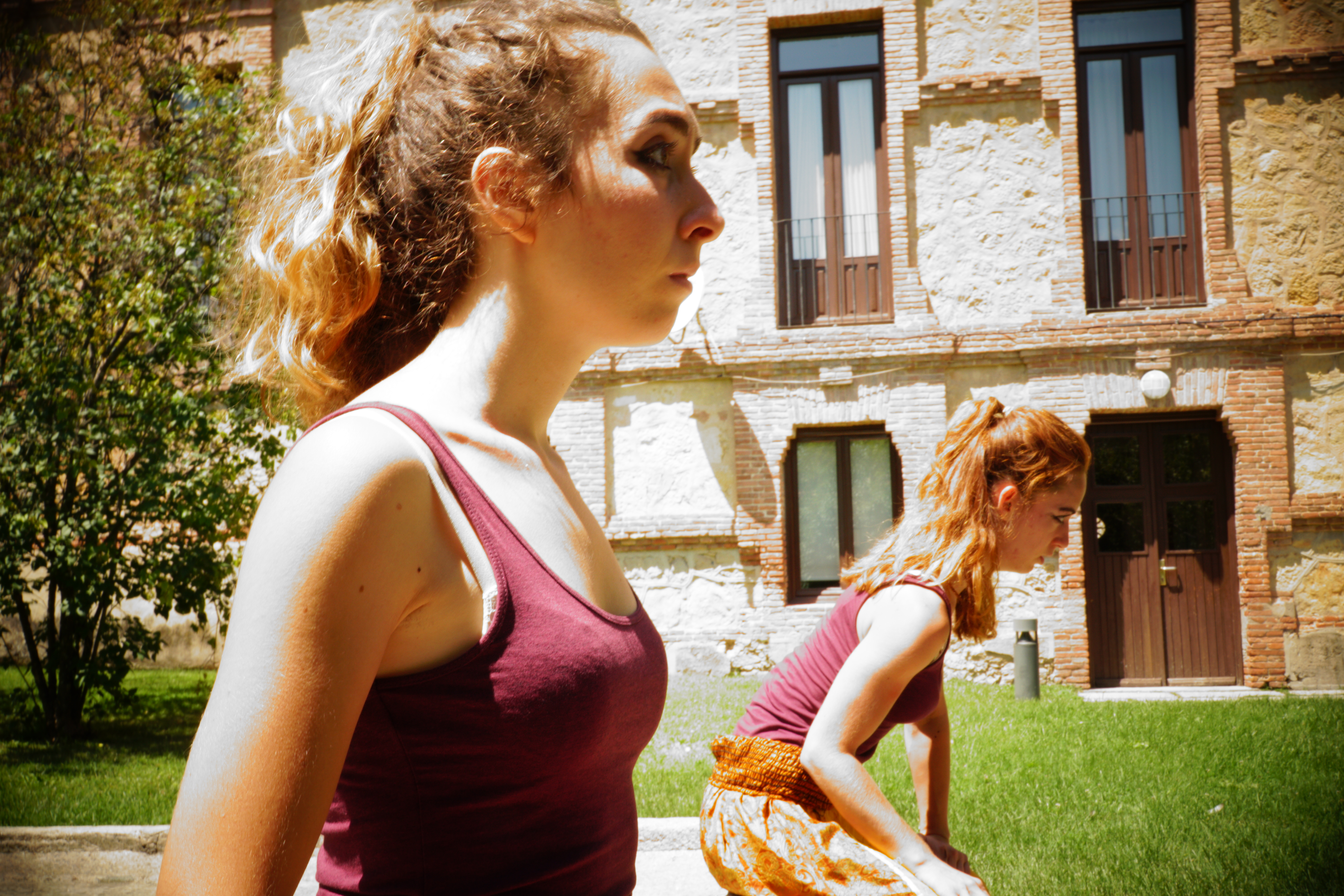 Giorgia and performer, looking intensely off camera
