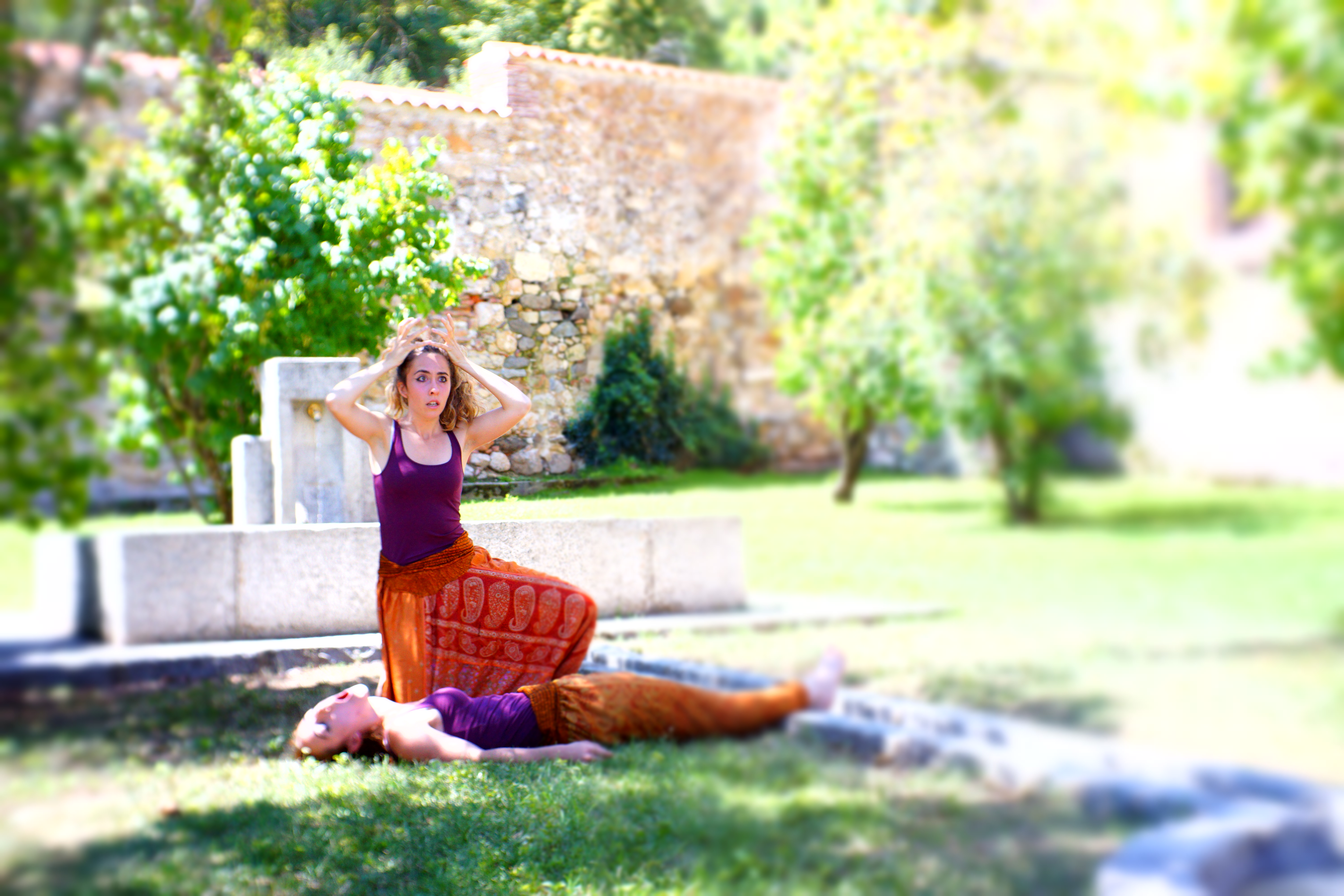 Giorgia lamenting above unconscious performer