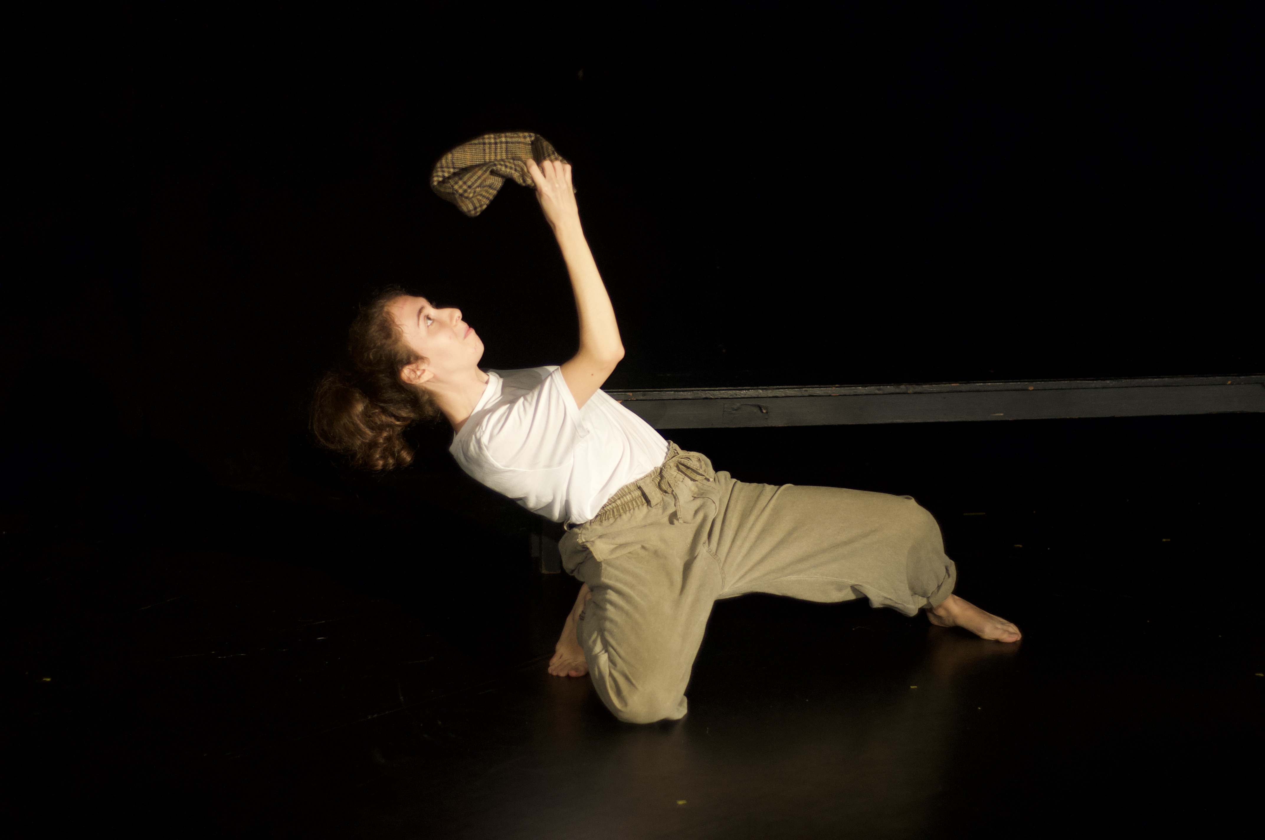 Giorgia doing physical theatre with hat