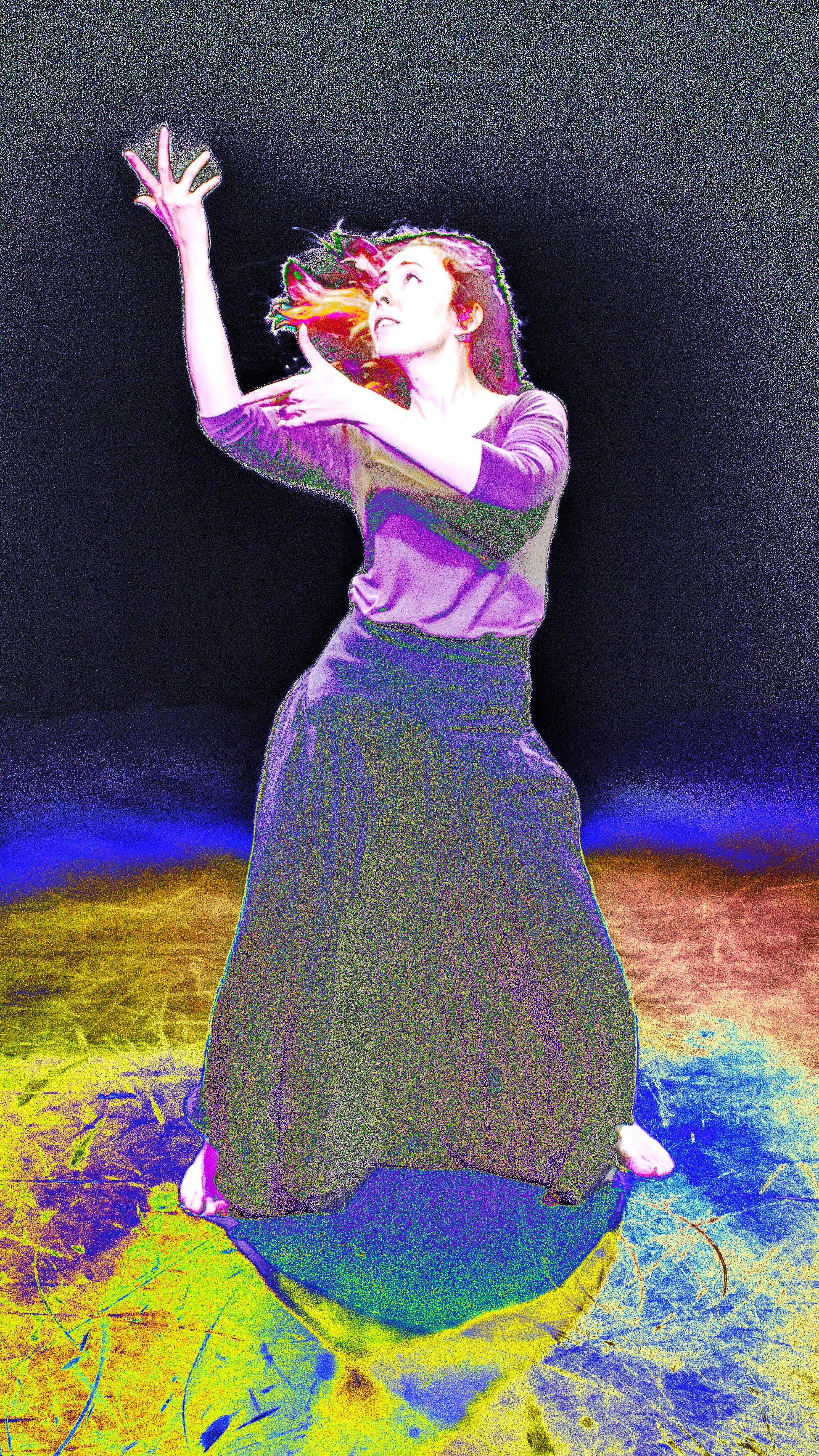 Giorgia throwing blue paper into the air